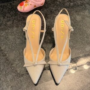 Unisa Women's Elegant Cream Pointed Heels